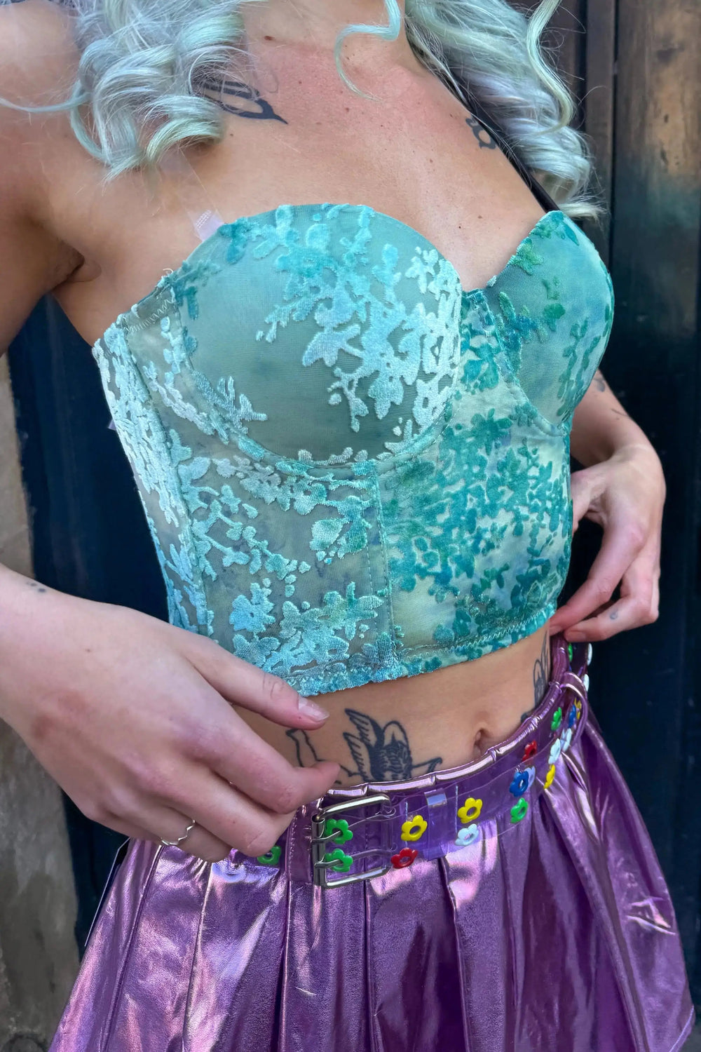 Side view of Dixie Velvet Corset Top showing sheer lace fabric and boning structure, ideal for alternative festival fashion.