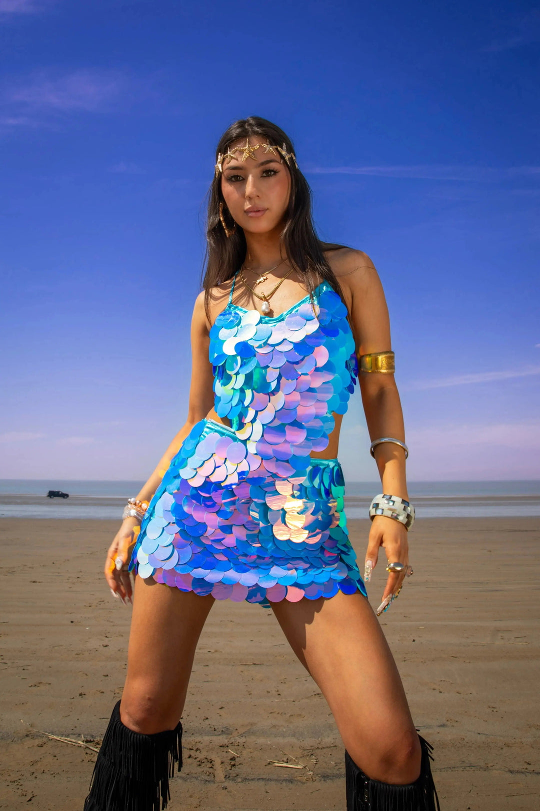 Belize Crop Top styled with bold sequin design for rave and festival looks, featured in vibrant beach photoshoot.