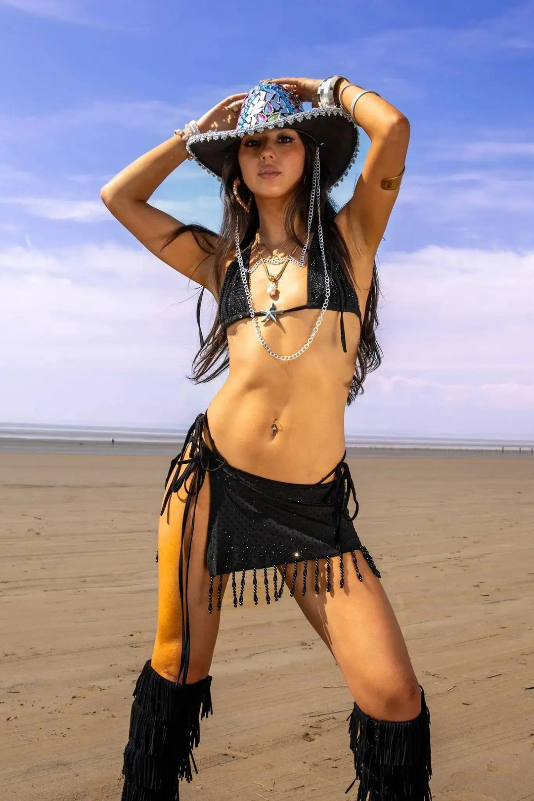 Black Tide Bikini styled with statement hat and fringe boots, perfect for rave and festival fashion from Wild Thing.