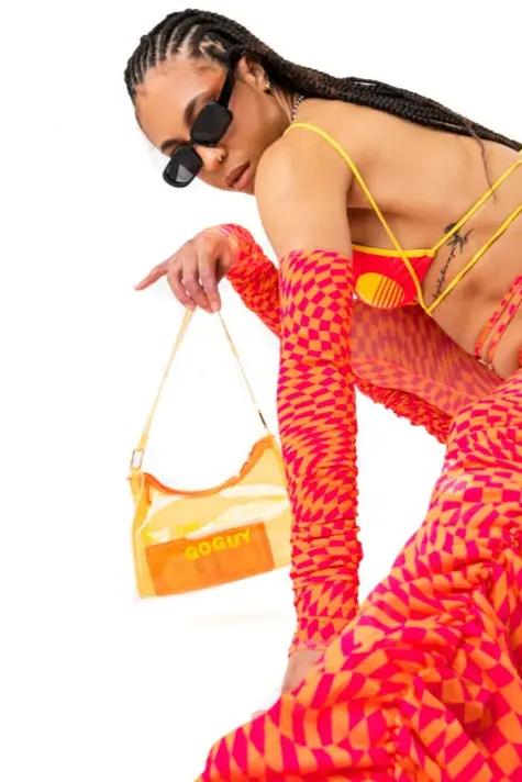 All Day All Night Gloves in red and pink checkered mesh, styled with rave festival outfit. Bold accessory for alternative fashion lovers.