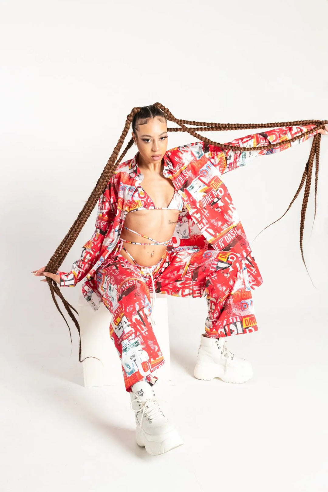 Dine and Dash Shirt in bold red graphic print styled with matching pants, ideal for rave and festival fashion from Wild Thing.