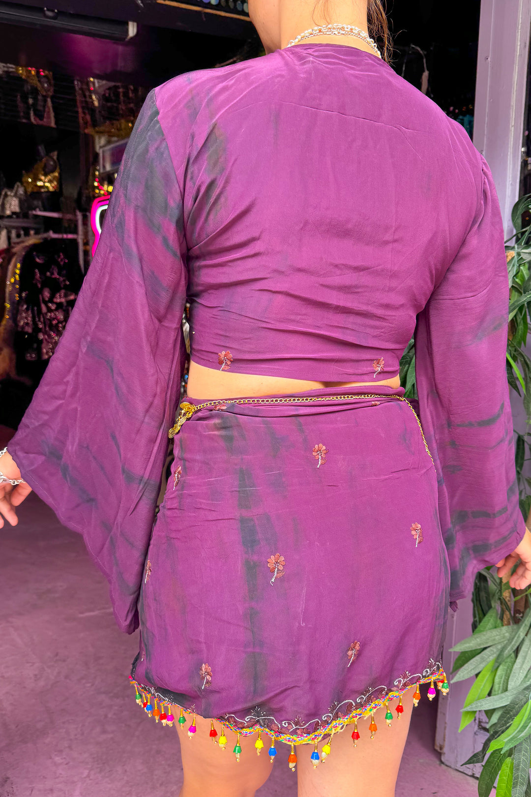 Back view of Sisterhood Skirt Bell Sleeve Set with embroidered details and multicolor bead fringe, stylish rave clothing from Wild Thing.