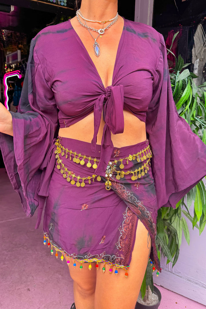 Sisterhood Skirt Bell Sleeve Set in deep purple with gold coin belt and colorful bead trim, ideal for rave and festival outfits on Wild Thing.